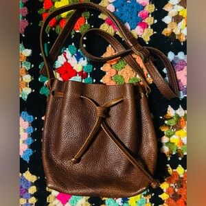 Portland Leather Company brown drawstring bucket bag